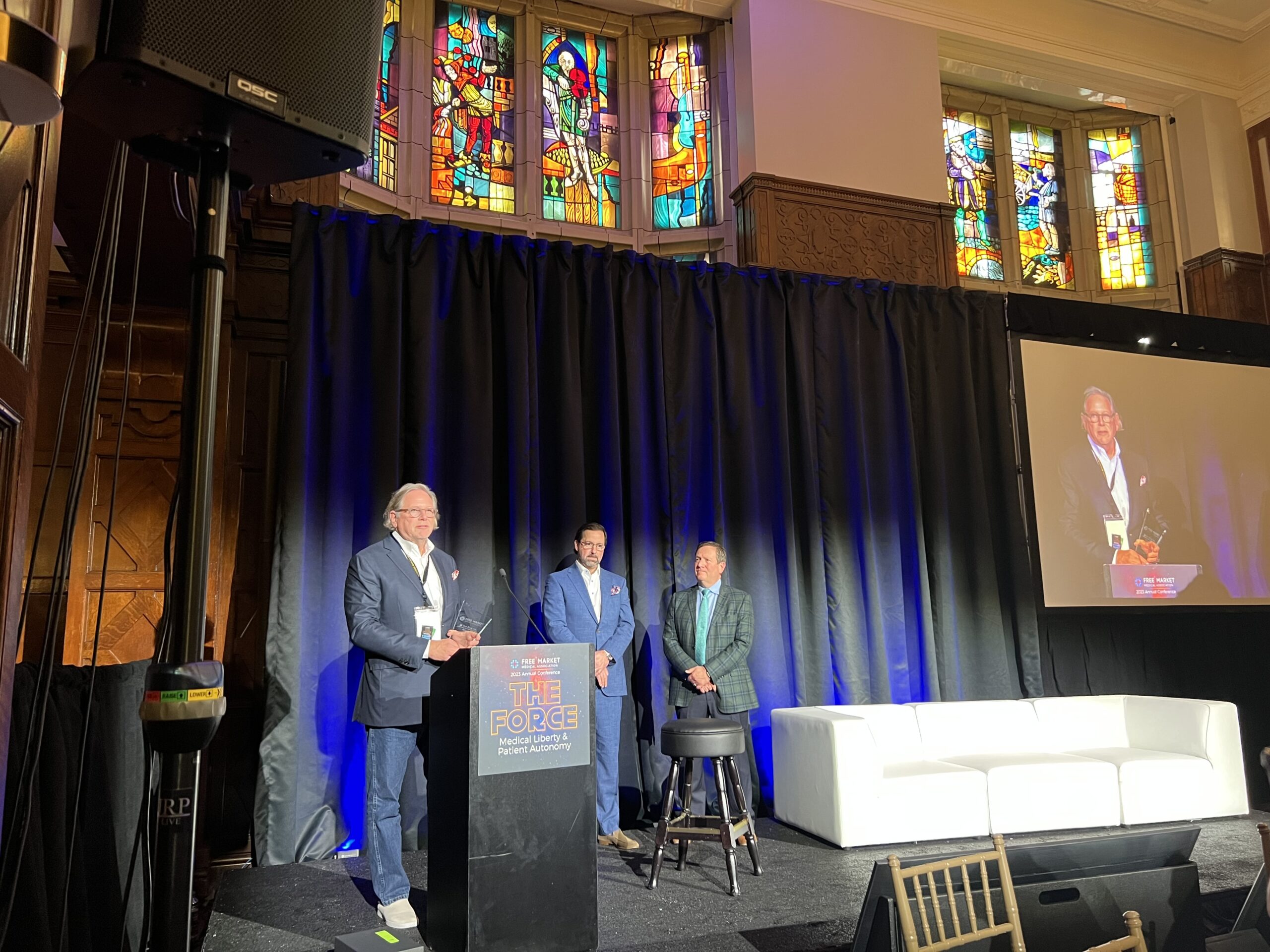 Roger Moczygemba, MD, Antrea Ferguson and Shankar Poncelet smiling Beacon Award Winners 2022